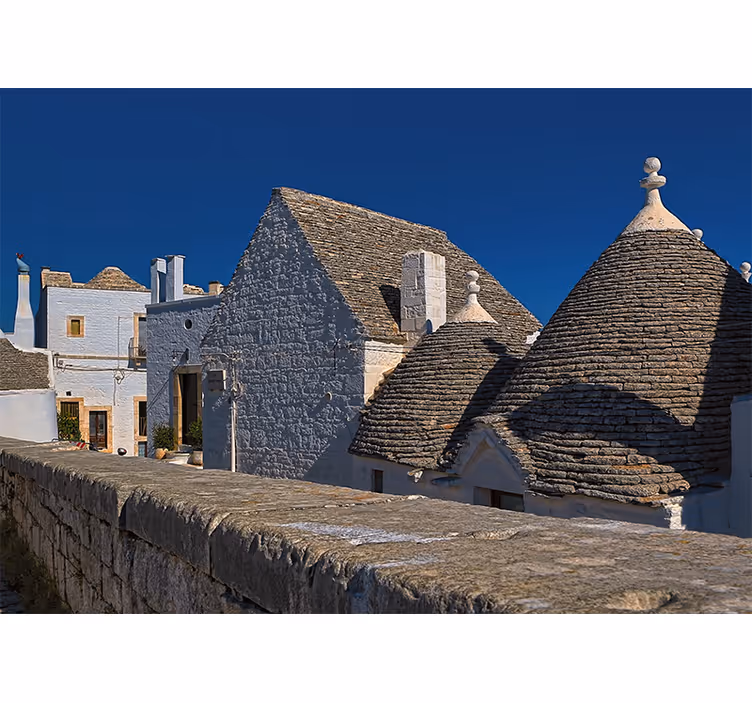 Mural ciudad tejados de trulli - TenVinilo