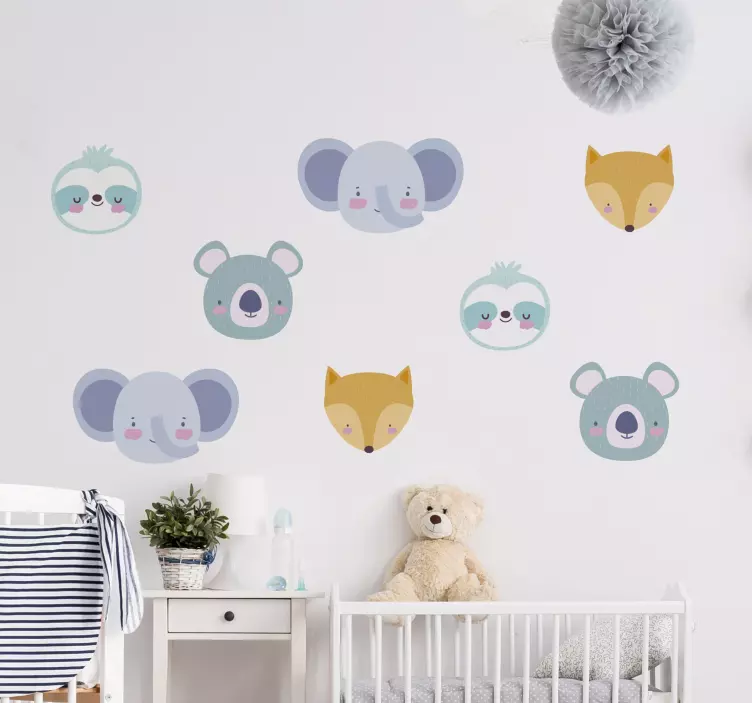 Vinilo infantil para pared caras de criaturas encantadoras - TenVinilo