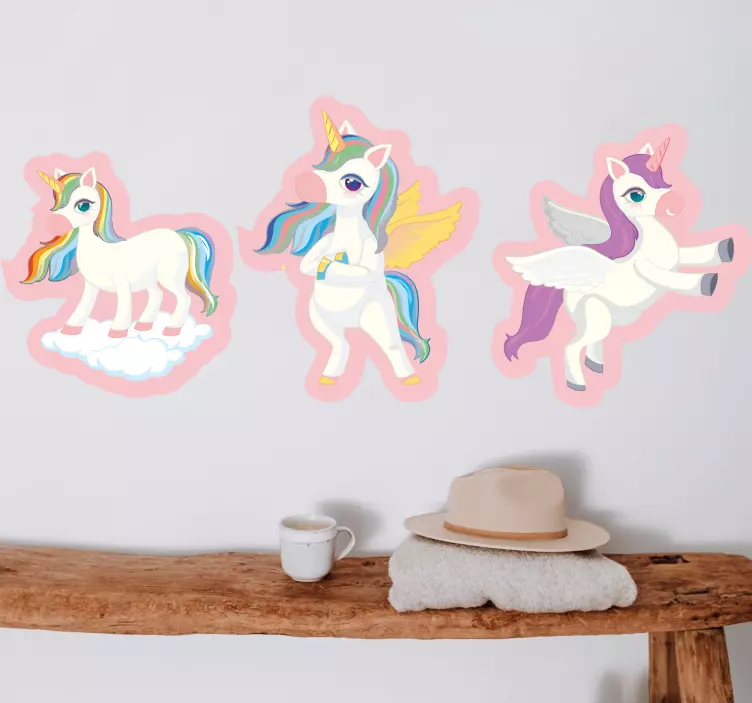 Vinilo infantil para pared trío de unicornios juguetones - TenVinilo