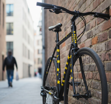 Calca para bicicleta gráficos de estrellas amarillas y rayos - TenVinilo