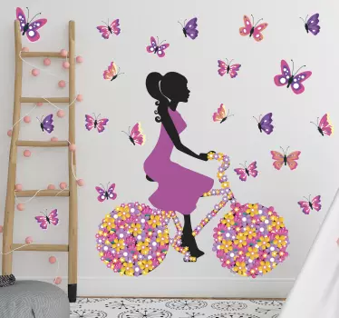 Vinilo de mariposas y mujer en bicicleta - TenVinilo