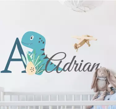 Vinilo habitación bebé dinosaurio azul con nombre - TenVinilo