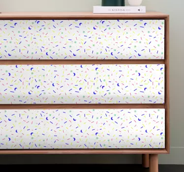 Vinilo mueble Patrón de chispas de colores - TenVinilo
