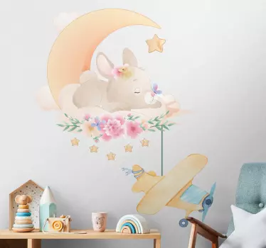 Vinilo pared animal Conejito durmiendo en la luna con avión de ju - TenVinilo