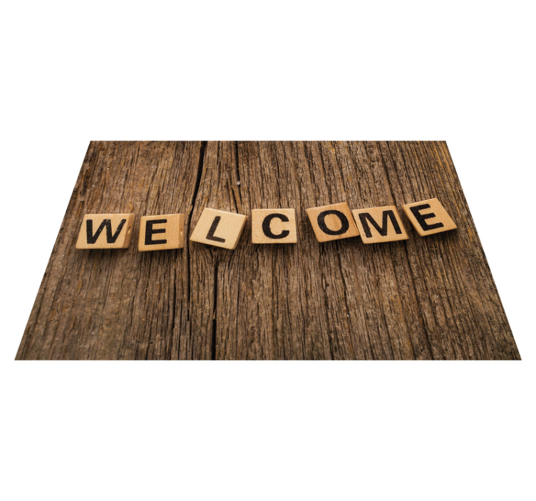 Alfombra vinílica frase alfabeto de madera de bienvenida - TenVinilo