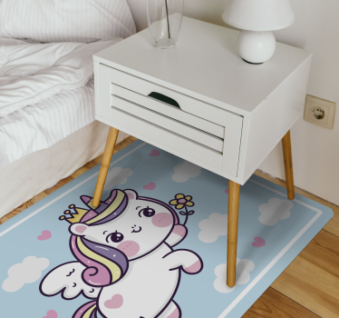 Alfombra de vinilo bebé Bebé unicornio en arco iris - TenVinilo