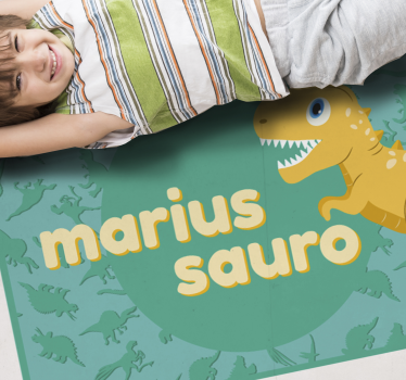 Alfombra de vinilo con nombre T-rex para niños sobre fondo azul - TenVinilo