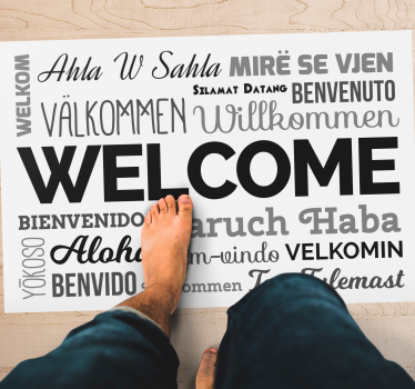 Alfombra vinílica recibidor diseño de bienvenida multilingüe - TenVinilo