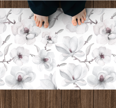 Alfombra vinilo flores Elegante rama con magnolia - TenVinilo
