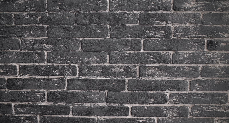Alfombra vinílica textura Ladrillos de piedra gris oscuro - TenVinilo